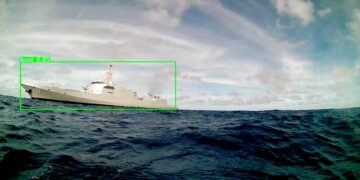 US Drone Faces Off Against Chinese Carrier: Photos Reveal Tension