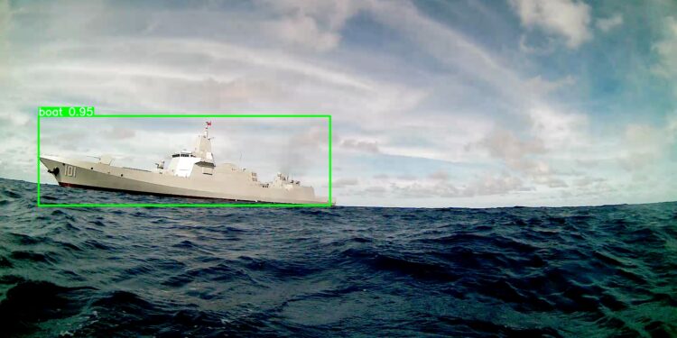 US Drone Faces Off Against Chinese Carrier: Photos Reveal Tension
