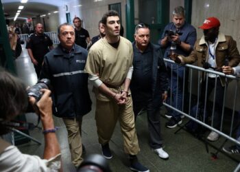 Luigi Mangione, accused of fatally shooting UnitedHealthcare CEO Brian Thompson on December 4, 2024, had two charges dismissed in state court. Mangione, 27, faced nearly a dozen charges for the shooting outside a midtown Manhattan hotel.