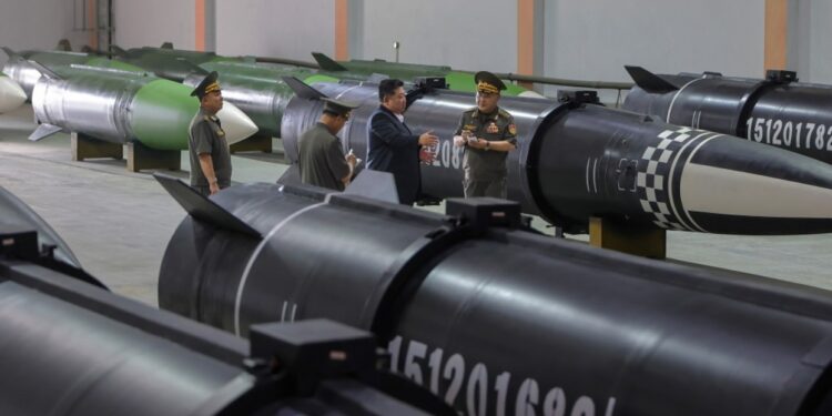 Kim Jong Un Inspects Massive Missile Plant: Photos Revealed